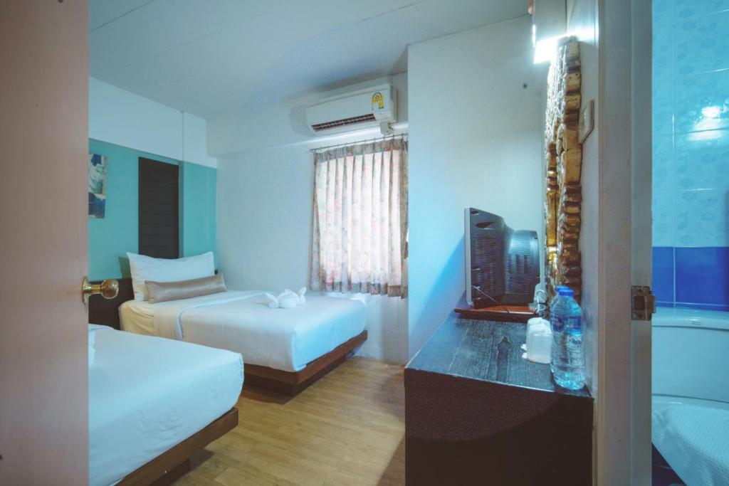 Двухместный (Бюджетный двухместный номер с 2 отдельными кроватями) отеля Sawasdee House, Бангкок
