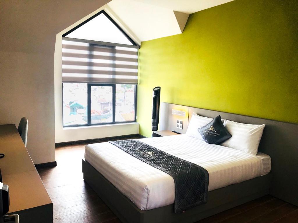 Двухместный (Двухместный номер Делюкс с 1 кроватью) отеля Kim Oanh Orchids Hotel, Далат