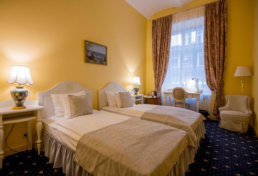 Двухместный (Стандартный двухместный номер с 2 отдельными кроватями) отеля Hotel Gutenbergs, Рига