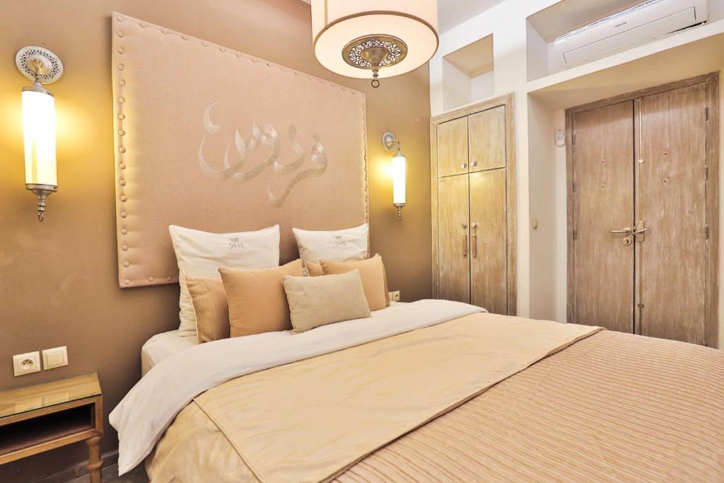 Двухместный (Двухместный номер с 1 кроватью и балконом – Firdaous) отеля Raoud Rayhane, Эс-Сувейра