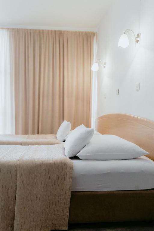 Двухместный (Двухместный номер с 2 отдельными кроватями) отеля Hotel Silver, Осиек