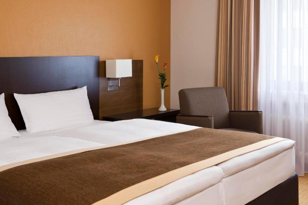 Двухместный (Двухместный номер бизнес-класса с 1 кроватью или 2 отдельными кроватями) отеля Trans World Hotel Donauwelle, Линц