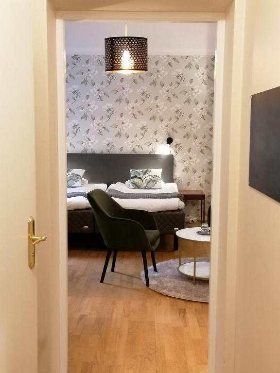 Двухместный (Улучшенный двухместный номер с 1 кроватью) отеля Hotel Duxiana Kristianstad, Кристианстад