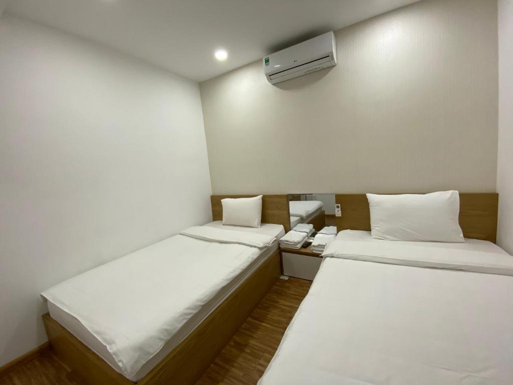 Апартаменты (Апартаменты с 2 спальнями и видом на море) апарт-отеля Gold Ocean Apartment, Нячанг