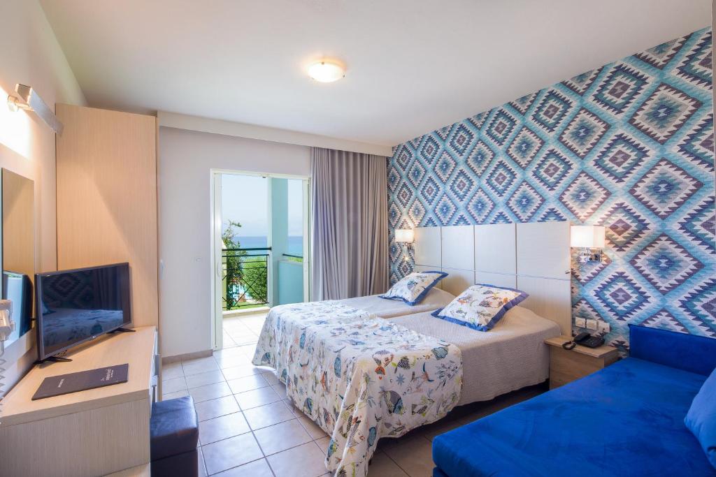 Двухместный (Стандартный двухместный номер с 1 кроватью или 2 отдельными кроватями и видом на сад) курортного отеля Mareblue Beach, Кассиопи