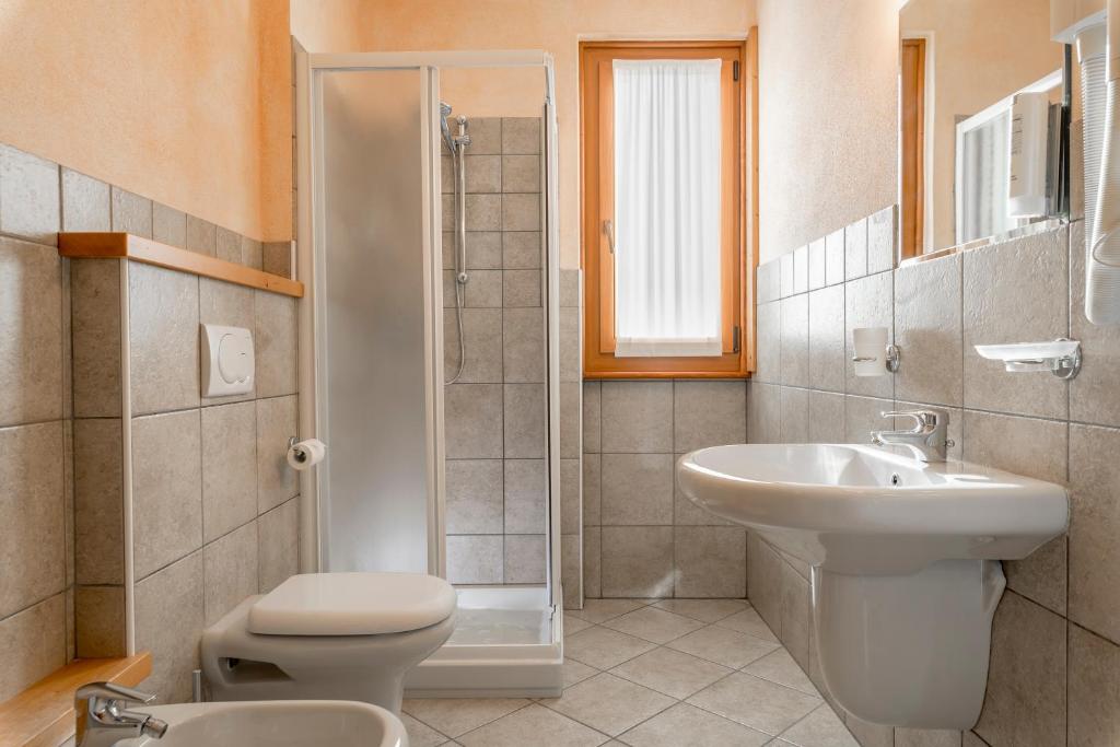 Апартаменты (Апартаменты с 1 спальней (для 5 взрослых) — Двухуровневые) апарт-отеля Chalet Stelle Di Neve, Бормио