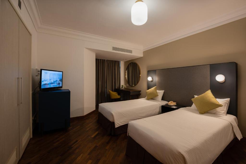 Двухместный (Двухместный номер Делюкс с 2 отдельными кроватями) отеля Fort Canning Lodge, Сингапур (город)