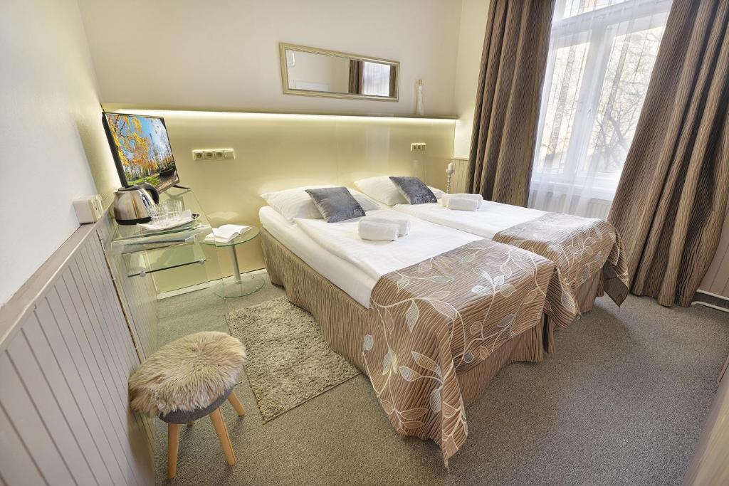 Двухместный (Двухместный номер с 1 кроватью или 2 отдельными кроватями) отеля Balkan, Прага
