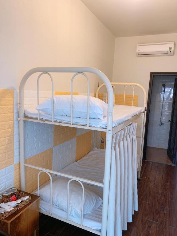 Номер (Односпальная кровать в общем номере для мужчин и женщин) курортного отеля Hoi An Phu Quoc Resort, Дуонг-Донг
