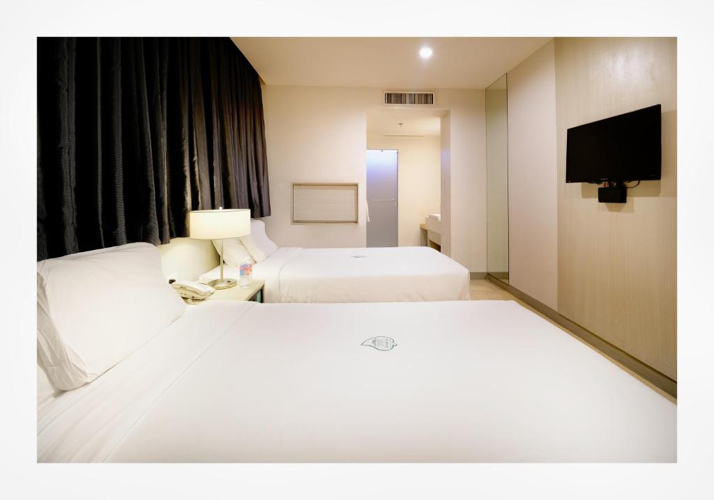 Двухместный (Стандартный двухместный номер с 2 отдельными кроватями) отеля Go Hotels Ortigas Center, Манила