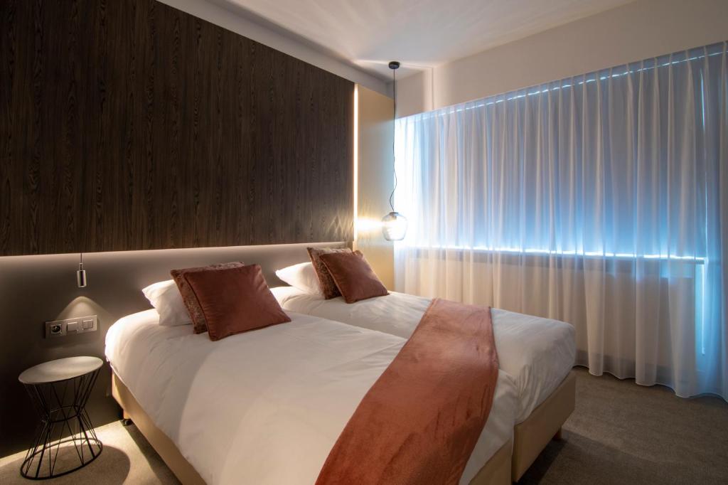Двухместный (Двухместный номер «Комфорт» с 2 отдельными кроватями и балконом) отеля Best Western Hotel Pax, Диксмёйде