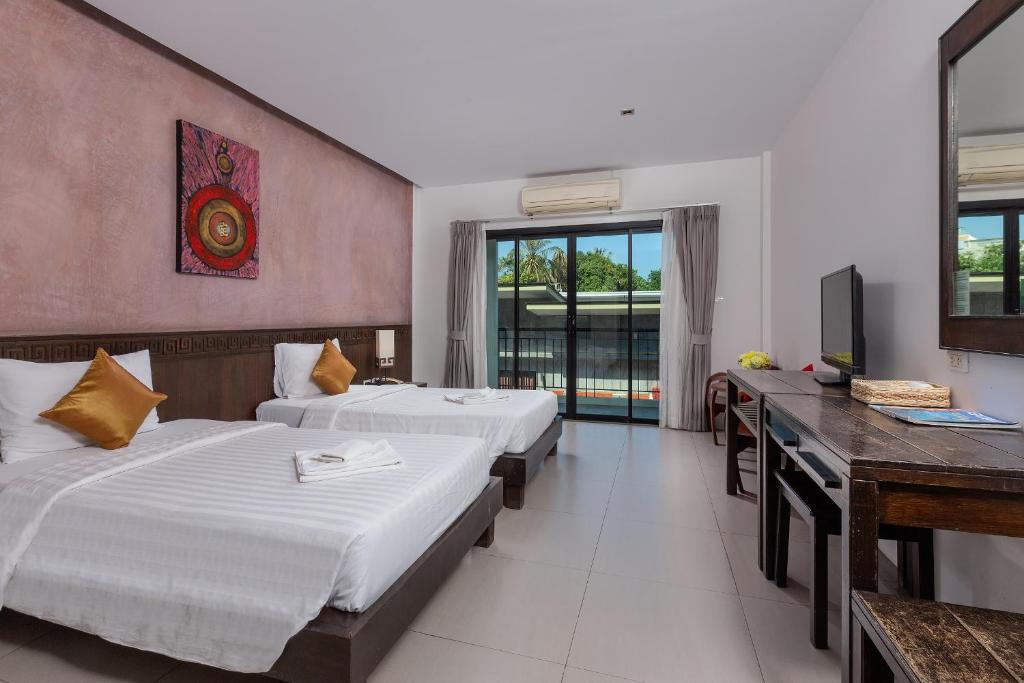 Двухместный (Двухместный номер Делюкс с 1 кроватью или 2 отдельными кроватями и видом на бассейн) отеля Phuketa, Пхукет