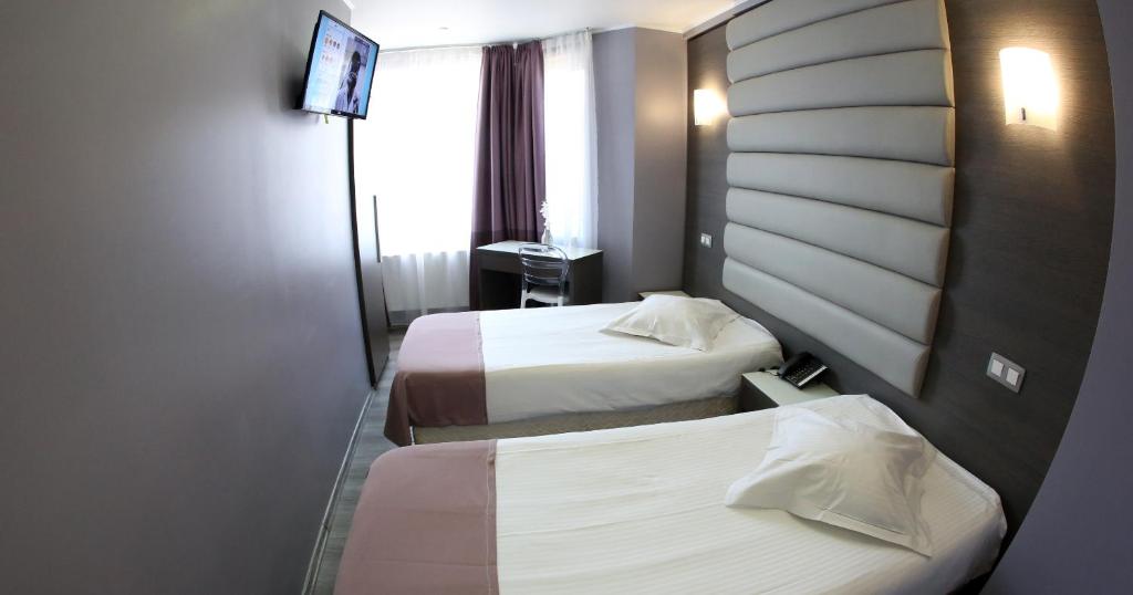 Двухместный (Двухместный номер с 2 отдельными кроватями) отеля Hotel Phenix, Брюссель