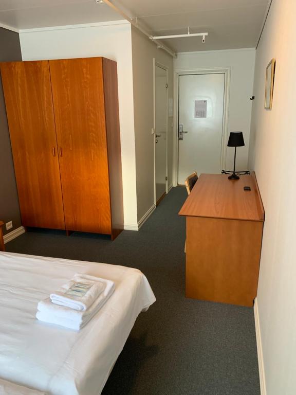 Двухместный (Бюджетный двухместный номер с 2 отдельными кроватями) отеля Narvik Budget Rooms, Нарвик