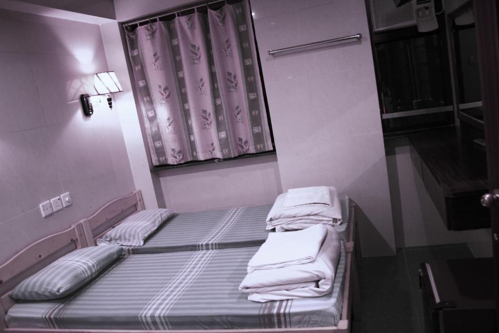 Двухместный (Бюджетный двухместный номер с 1 кроватью или 2 отдельными кроватями) гостевого дома UK Hostel, Гонконг (город)
