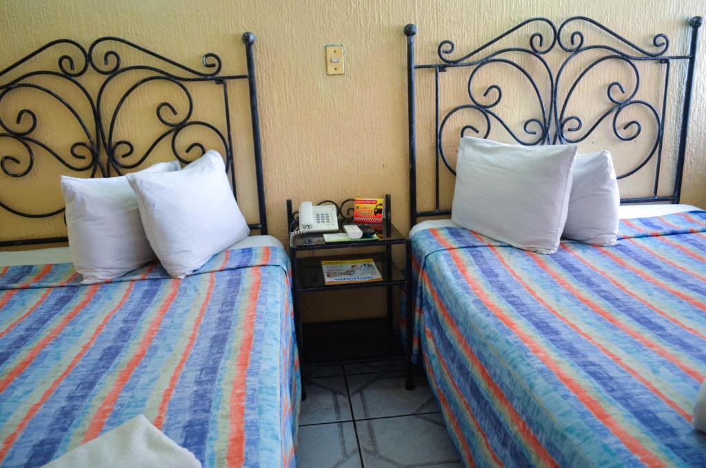 Двухместный (Двухместный номер с 2 двуспальными кроватями) отеля Hotel Terraza del Sol, Коацакоалькос