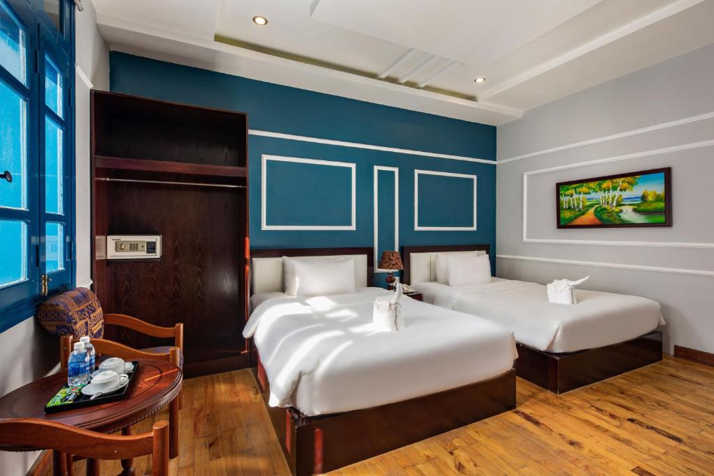 Двухместный (Двухместный номер Делюкс с 2 отдельными кроватями) отеля Sofia Boutique Hotel, Дананг