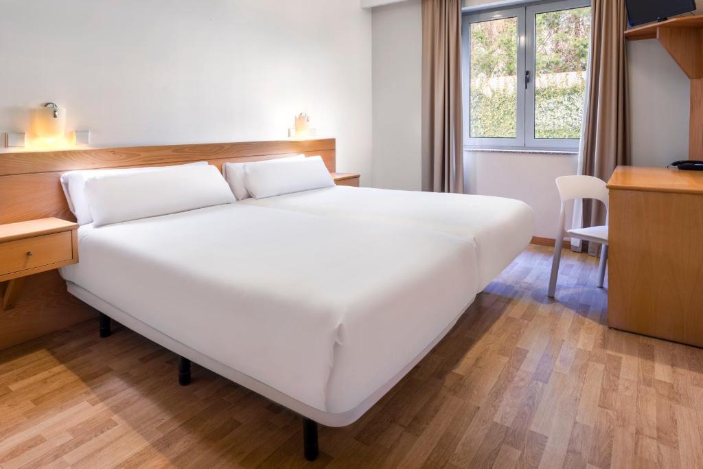 Двухместный (Двухместный номер с 2 отдельными кроватями) отеля Hotel Lamacaes, Брага