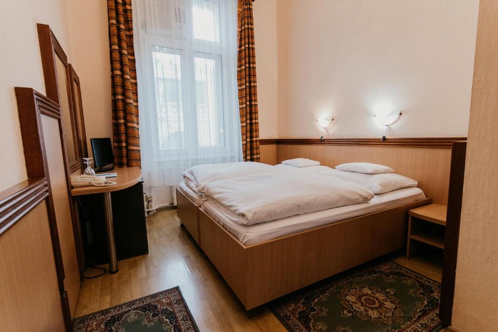 Двухместный (Бюджетный двухместный номер с 1 кроватью или 2 отдельными кроватями) отеля Tisza Hotel, Сегед