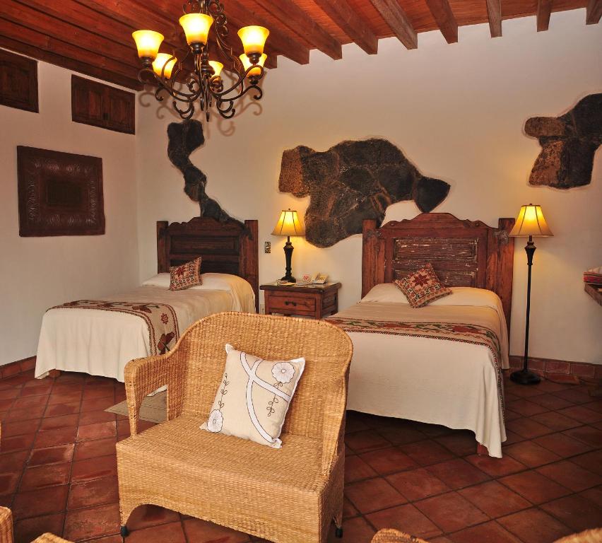Двухместный (Улучшенный двухместный номер с 2 отдельными кроватями) отеля Porton del Cielo, Пацкуаро