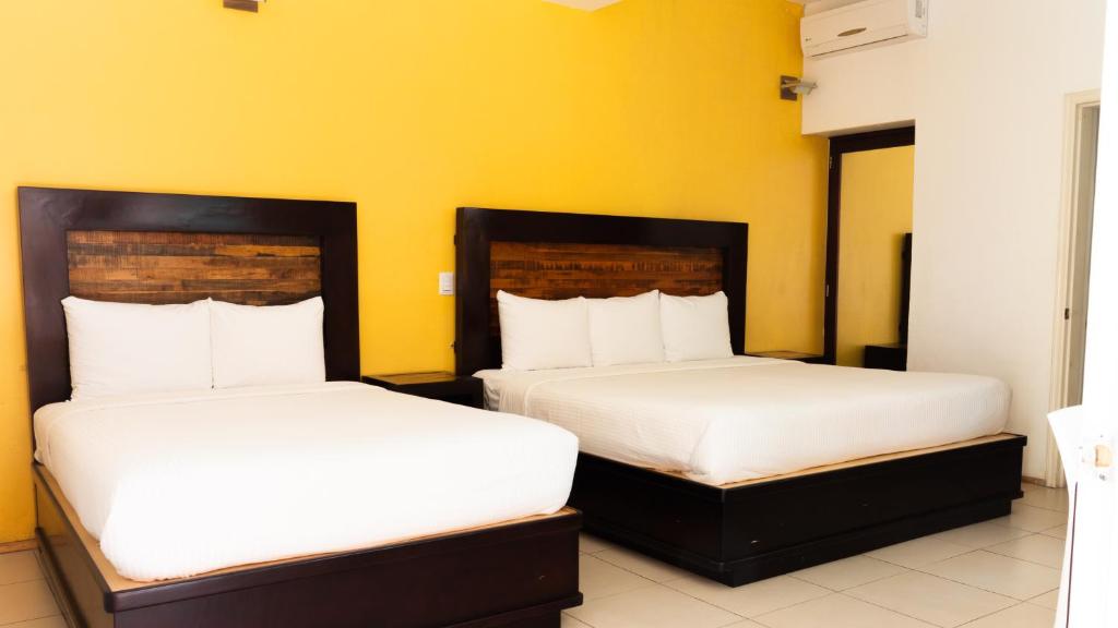 Двухместный (Двухместный номер с 2 отдельными кроватями и собственной ванной комнатой) отеля Happy Express Hotel, Оахака-де-Хуарес