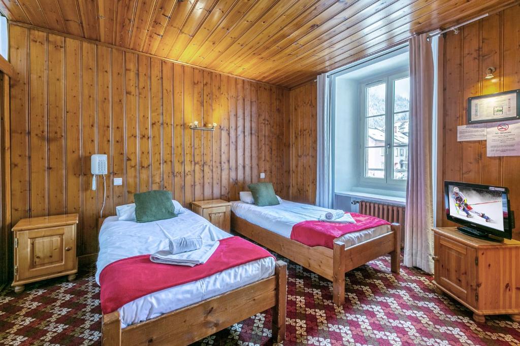 Двухместный (Небольшой двухместный номер с 2 отдельными кроватями) отеля Hotel Le Chamonix, Шамони-Мон-Блан