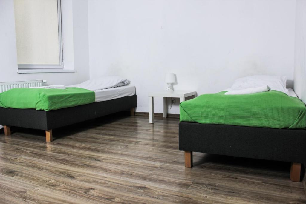 Двухместный (Двухместный номер с 2 отдельными кроватями и ванной комнатой) хостела Pokoje Babina, Калиш