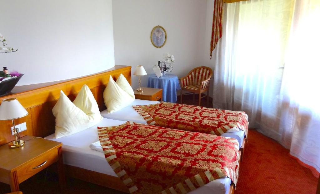 Двухместный (Двухместный номер с 2 отдельными кроватями и душем) отеля Gardenhotel Premstaller, Больцано