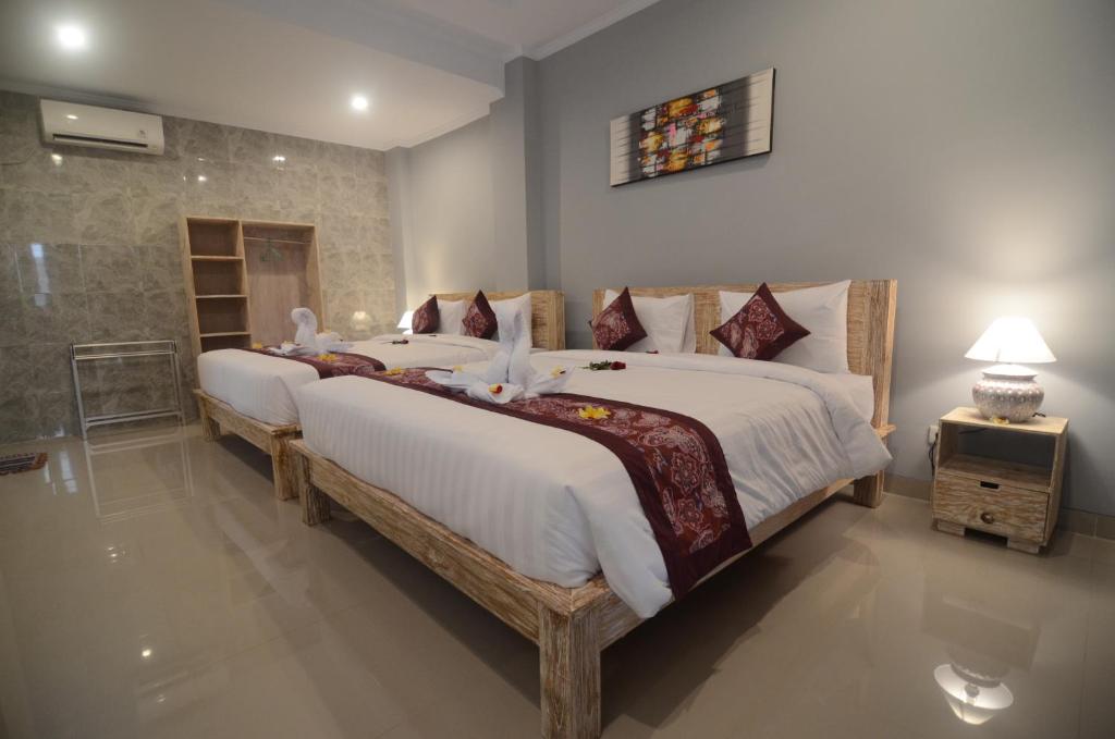 Семейный (Cемейный номер с собственной ванной комнатой), Kusuma Guesthouse 2