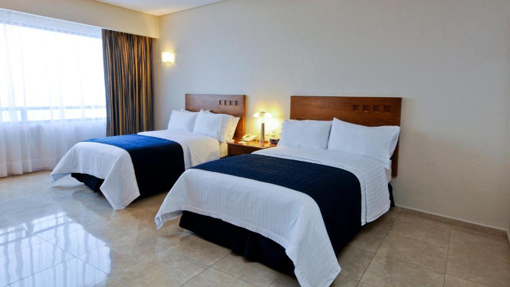 Двухместный (Двухместный номер с 2 двуспальными кроватями - Для некурящих) курортного отеля Holiday Inn Veracruz-Boca Del Rio, Веракрус