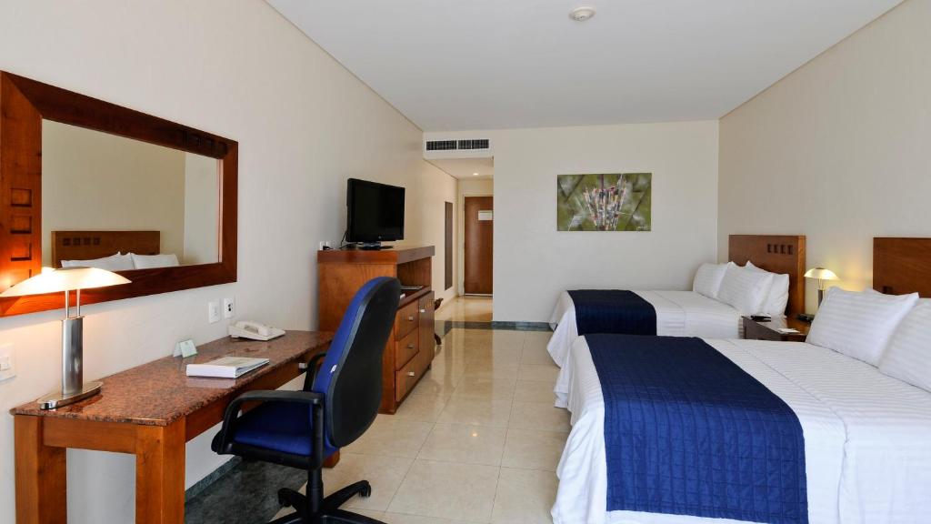 Двухместный (Двухместный номер с 2 двуспальными кроватями и видом на океан - Курение разрешено) курортного отеля Holiday Inn Veracruz-Boca Del Rio, Веракрус