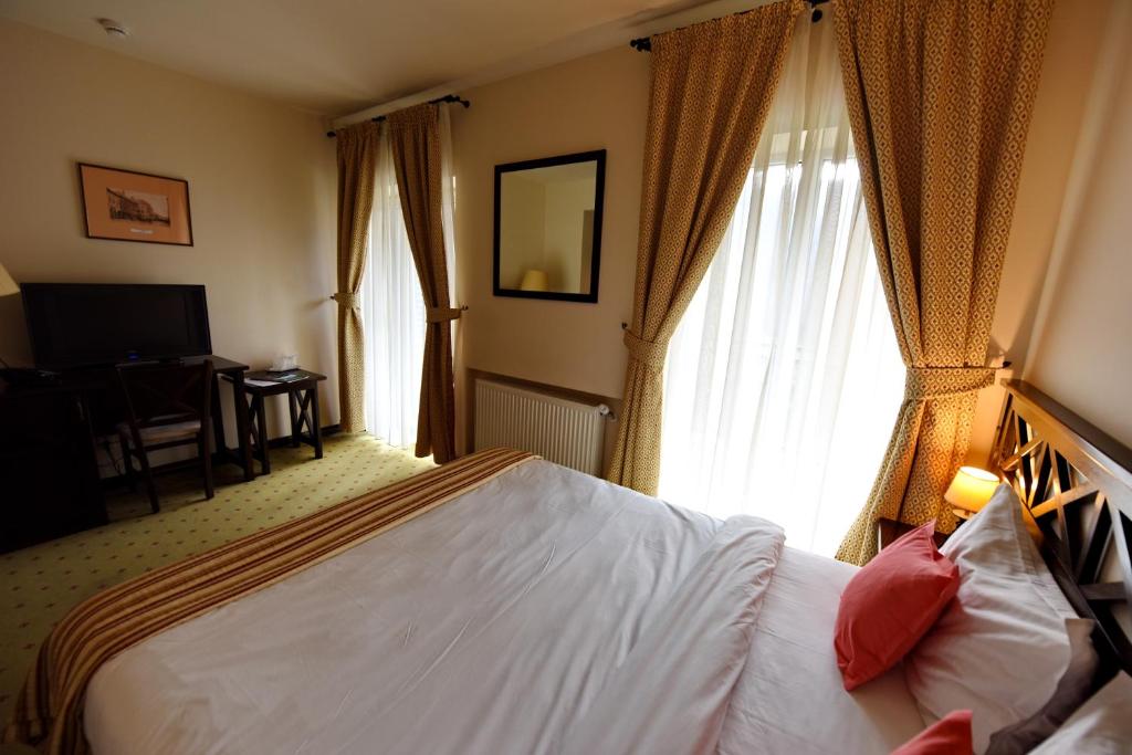 Двухместный (Двухместный номер с 1 кроватью и балконом) отеля Hotel Gradina Morii, Сигету-Мармацией