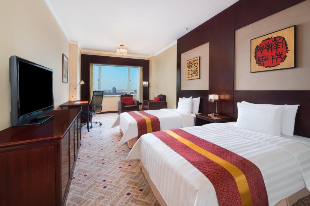 Двухместный (Клубный номер бизнес-класса с 2 двуспальными кроватями - Для некурящих) отеля Crowne Plaza Shanghai Pudong, Шанхай