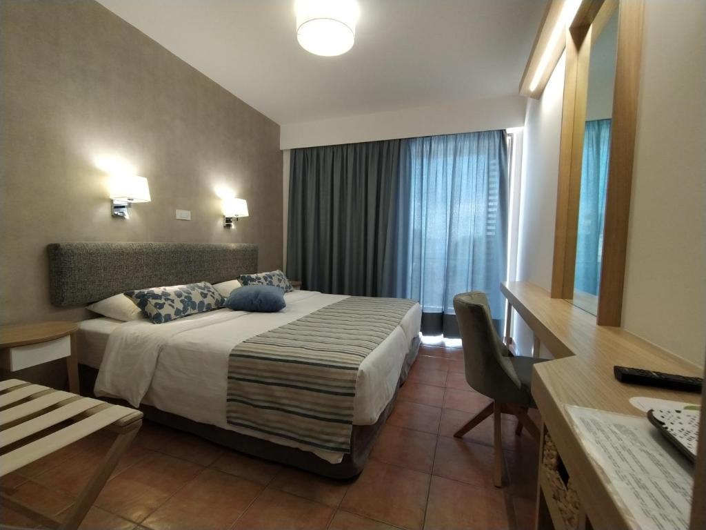 Двухместный (Улучшенный двухместный номер с 2 отдельными кроватями и видом на сад) отеля Apollon Hotel, Толон