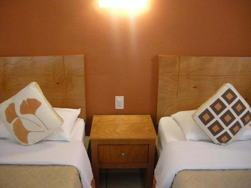 Двухместный (Двухместный номер с 2 двуспальными кроватями) отеля Hotel Posada Real, Лагос-де-Морено