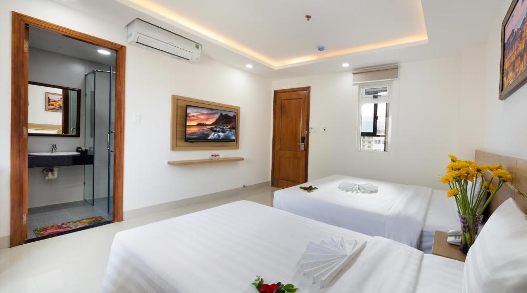 Двухместный (Стандартный двухместный номер с 2 отдельными кроватями) апартамента XO Hotel & Apartments, Нячанг