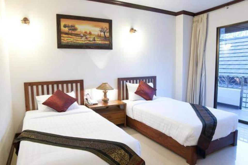 Двухместный (Улучшенный двухместный номер с 1 кроватью или 2 отдельными кроватями) отеля Baankhun Chiang Mai, Чиангмай
