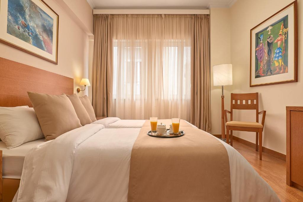 Двухместный (Стандартный двухместный номер с 2 отдельными кроватями) отеля Athos Hotel, Афины