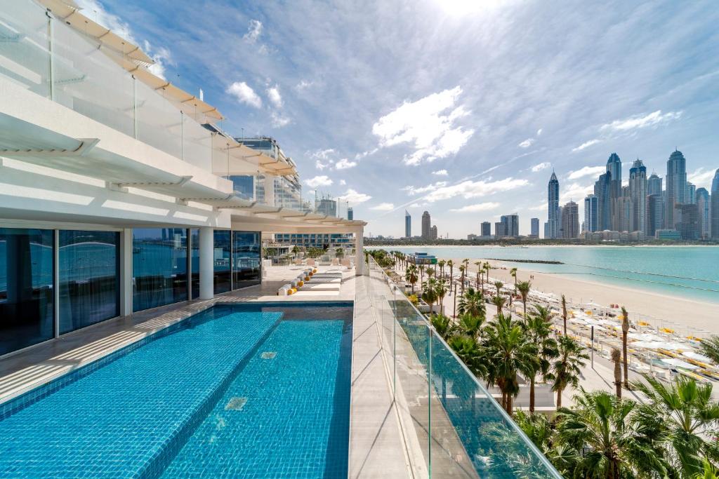 Апартаменты (Резиденция с 4 спальнями и собственным бассейном) курортного отеля Five Palm Jumeirah Dubai, Дубай