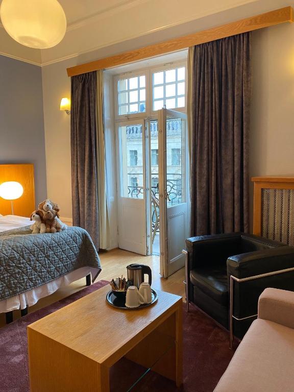 Семейный (Улучшенный номер с кроватью размера «king-size») отеля Hotel Kung Carl; BW Premier Collection, Стокгольм