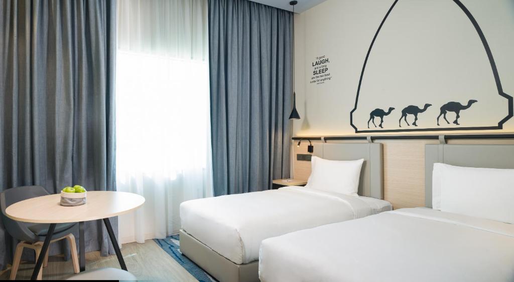Двухместный (Улучшенный двухместный номер с 2 отдельными кроватями) отеля Swiss-Belinn Muscat Oman, Маскат