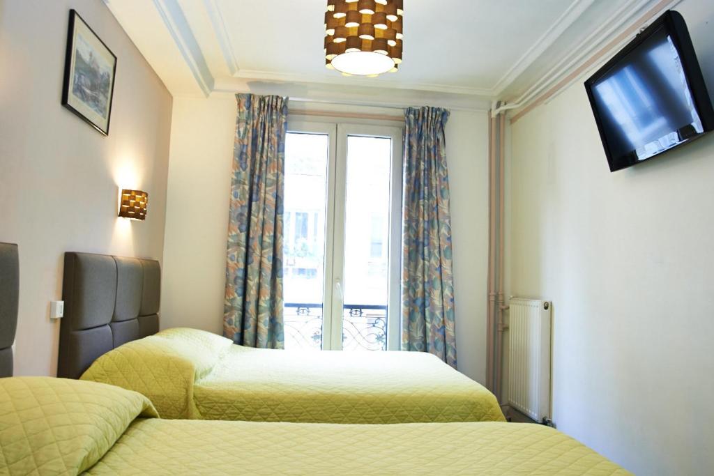 Двухместный (Двухместный номер с 2 отдельными кроватями) отеля Hotel Luxor, Париж