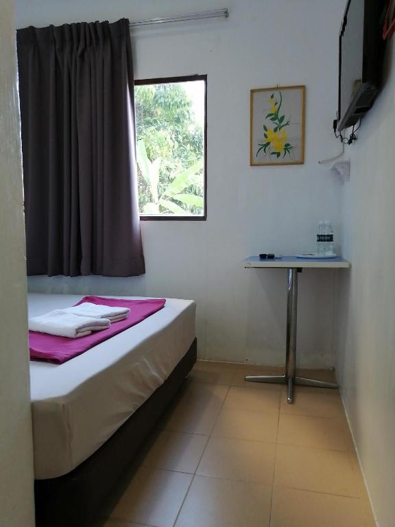 Двухместный (Бюджетный двухместный номер с 1 кроватью) мотеля Rasa Motel, Пенанг