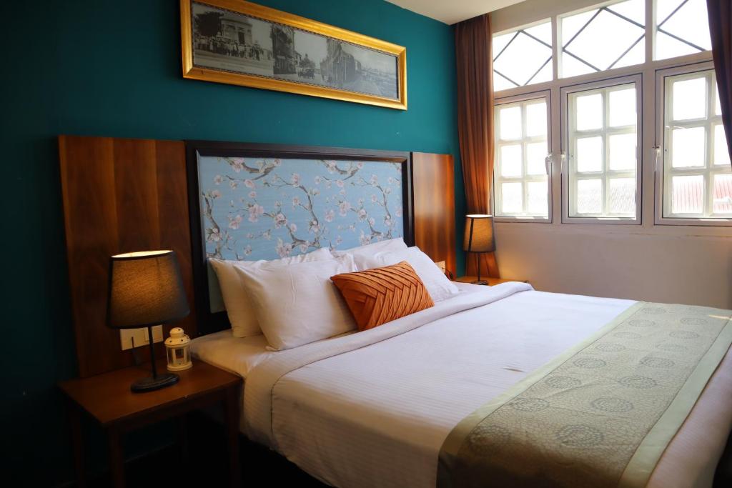 Двухместный (Улучшенный номер с кроватью размера «king-size») отеля Armenian Street Heritage Hotel, Джорджтаун