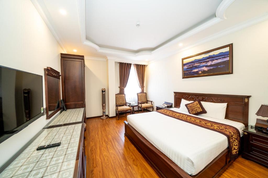 Двухместный (Улучшенный двухместный номер с 1 кроватью или 2 отдельными кроватями) отеля 7s Mai Vang 2 Hotel Dalat, Далат