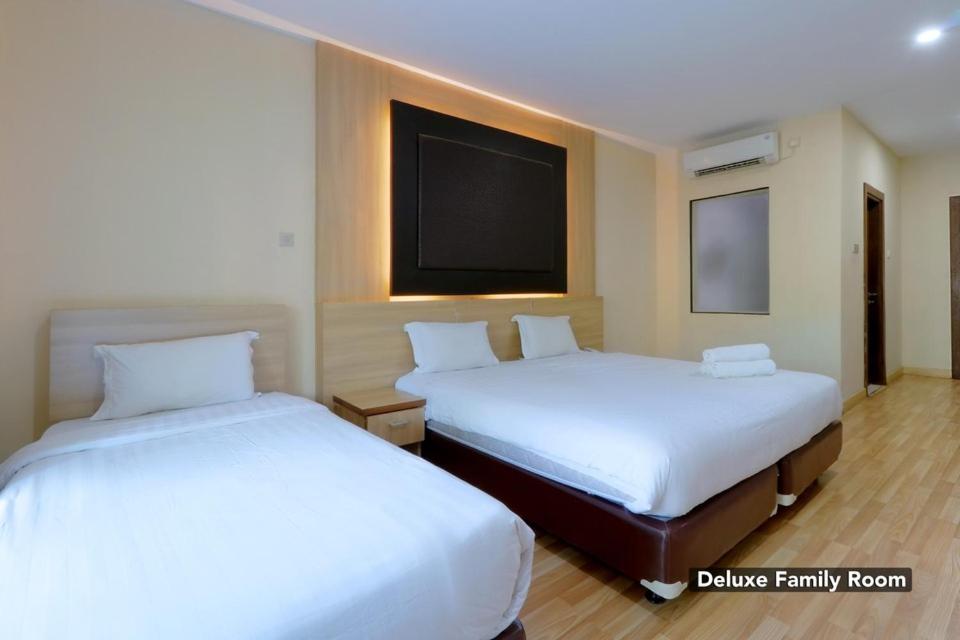 Семейный (Семейный номер Делюкс) отеля Mutiara Suites, Джакарта