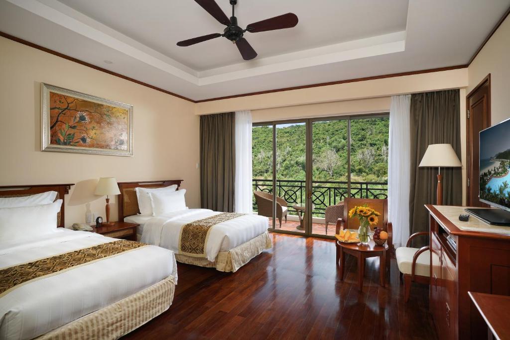 Двухместный (Двухместный номер «Гранд Делюкс» с 2 отдельными кроватями — полный пансион) курортного отеля Vinpearl Nha Trang Resort, Вин Нгуен