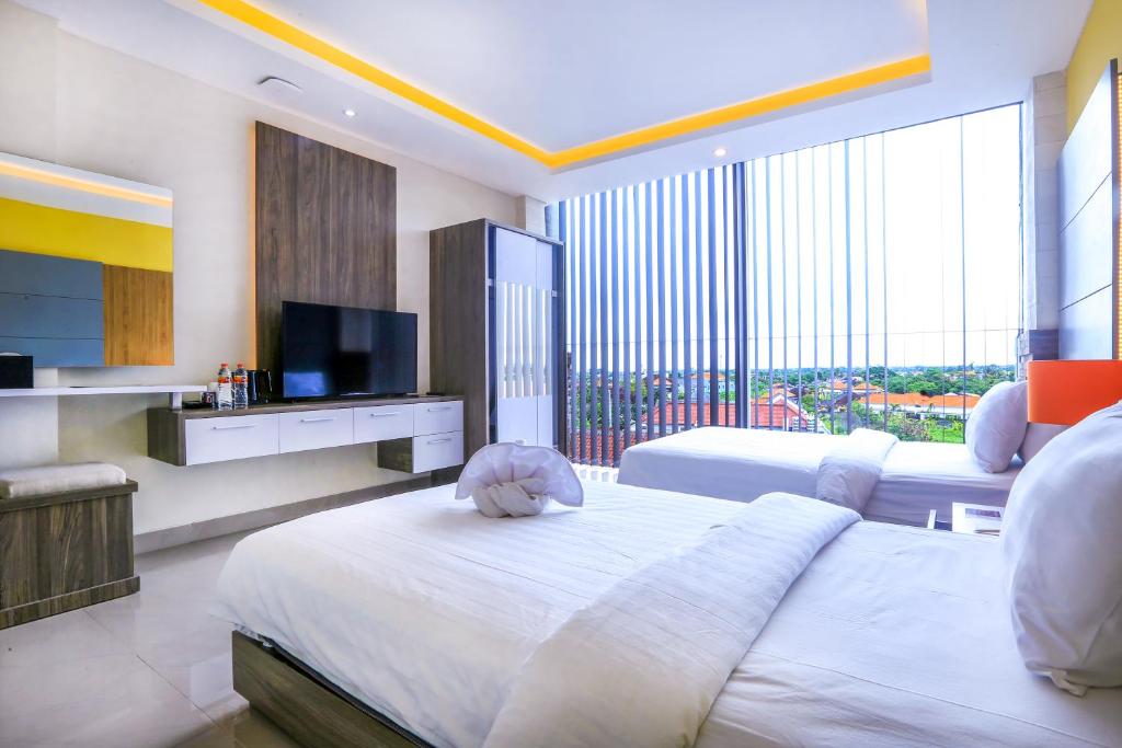 Двухместный (Двухместный номер Делюкс с 2 отдельными кроватями, вид на деревню) отеля Canggu Dream Village, Чангу
