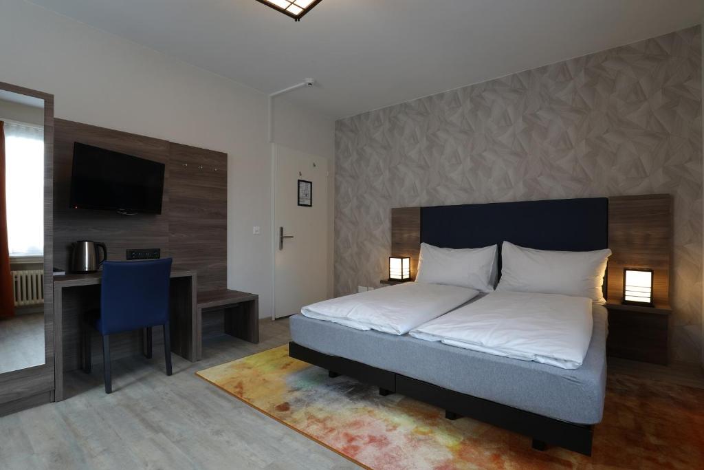 Двухместный (Большой двухместный номер с 1 кроватью или 2 отдельными кроватями) отеля Hotel Spatz, Люцерн