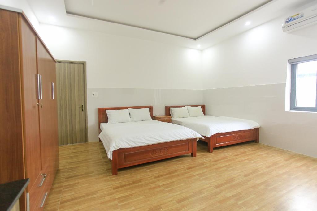 Семейный (Улучшенный семейный номер) отеля OYO 1068 Fussa Hostel And Apartment, Дананг